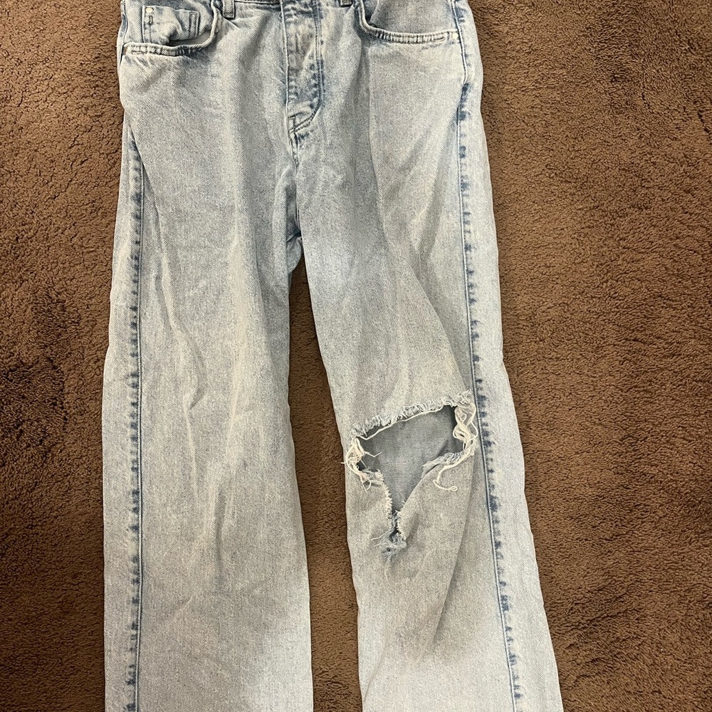 Distressed Light Blue Jeans